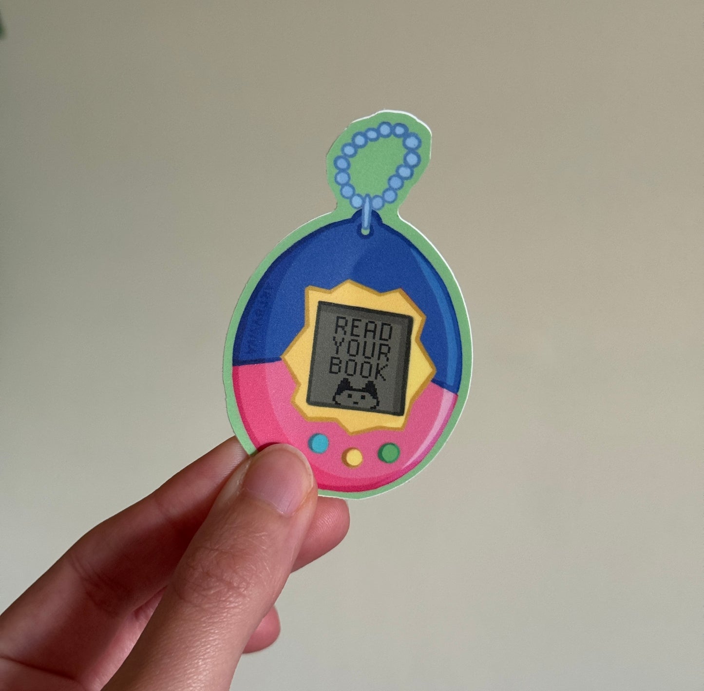 Tamagotchi Bookish Kindle Sticker