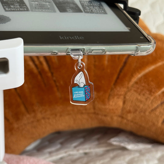 Kindle device with a charm attached